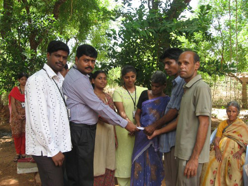 Residents presenting a memento our CEO & Staff 