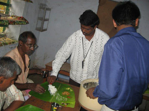 DCI Staff serving food to residents